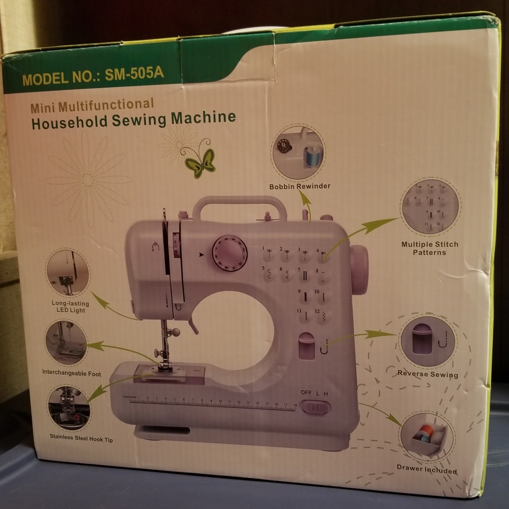 Compact Pink and White Sewing Machine - Picture 2 of 3